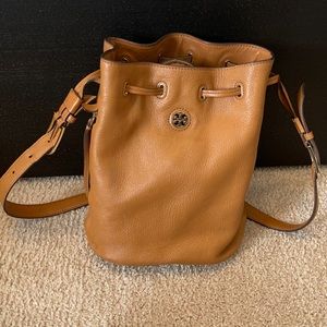 Tory Burch brown leather bucket bag.